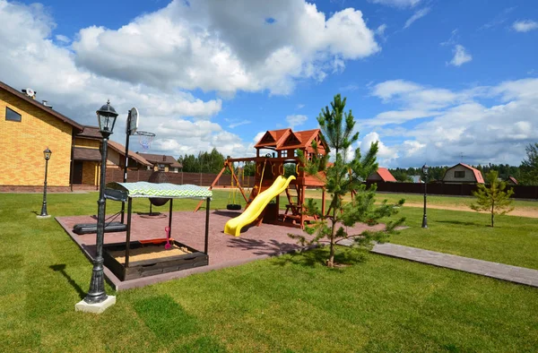 A children's Playground. Country house.Landscape. — Stock Photo, Image