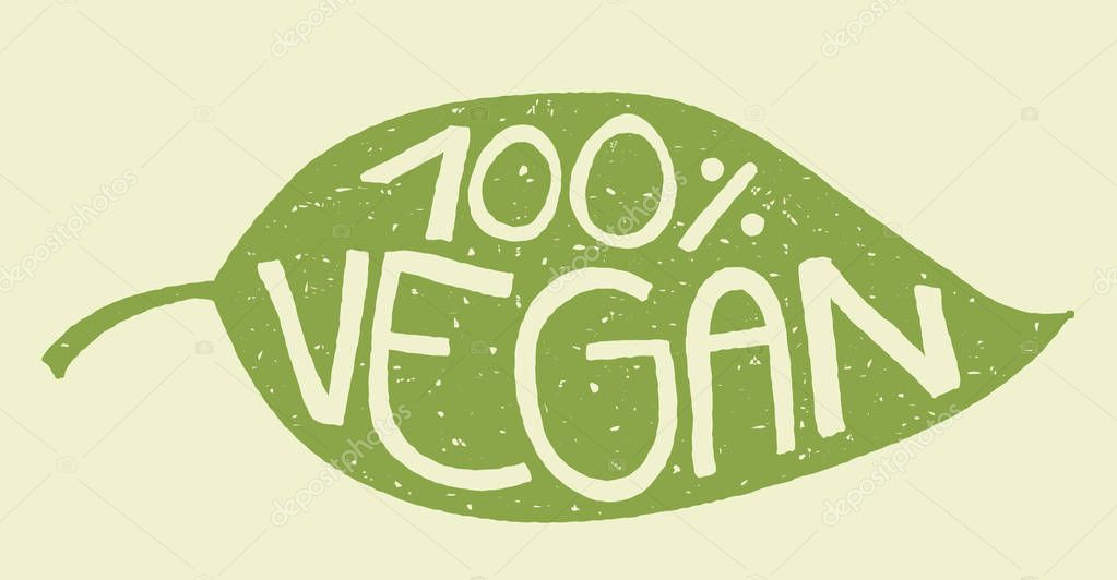 Green leaf with rubber stamp effect and hand lettering of the text 100% vegan.