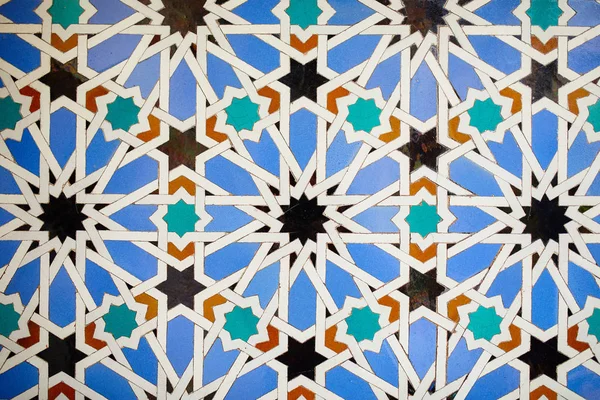 Tegelachtergrond in het Alcazar de Sevilla in Spanje — Stockfoto