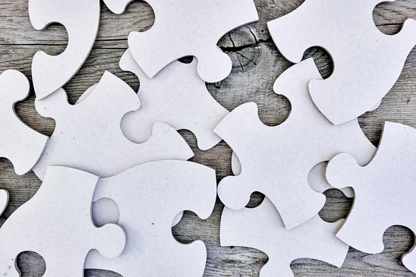 Peças de quebra-cabeças de papelão — Fotografia de Stock