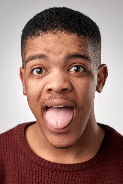 African man making silly expression — Stock Photo, Image