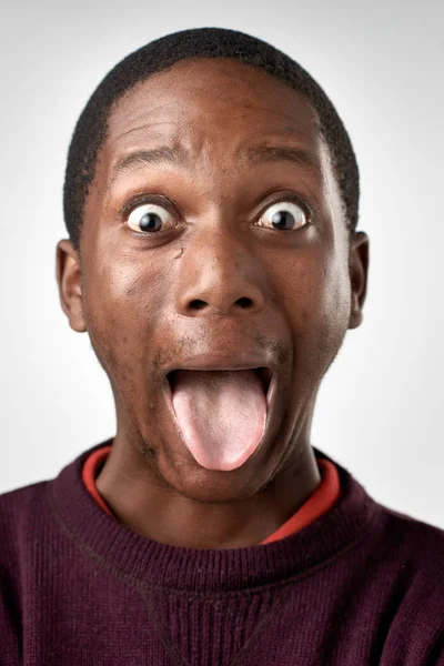 African man making silly expression — Stock Photo, Image