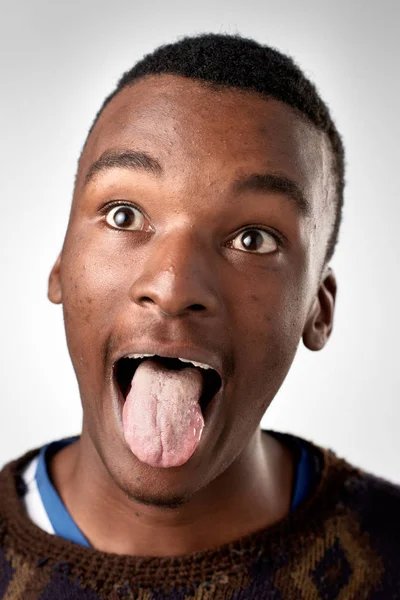 African man making silly expression — Stock Photo, Image