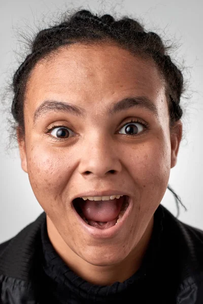 Surprised mixed race woman face — Stock Photo, Image