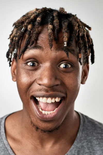 African man making silly expression — Stock Photo, Image