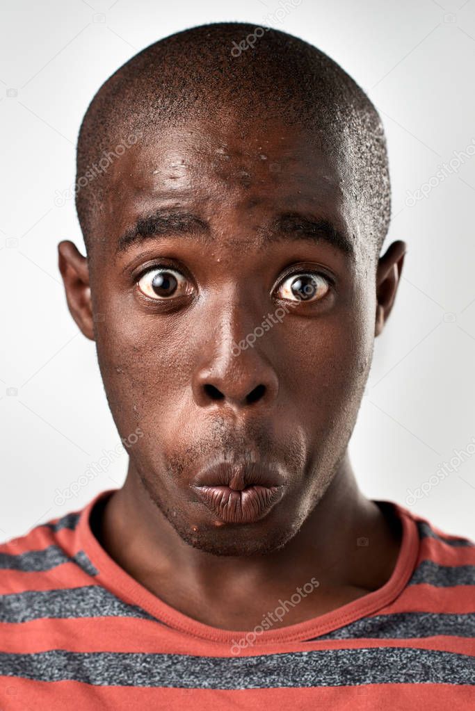 African man making silly expression Stock Photo by ©Daxiao_Productions  129342734