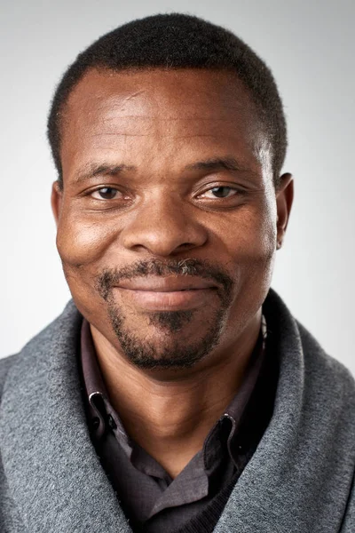 Adult African man smiling — Stock Photo, Image