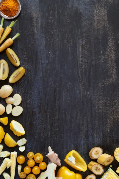 Yellow toned fruits and vegetables slices — Stock Photo, Image