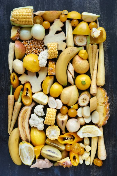 Fette di frutta e verdura di colore giallo — Foto Stock
