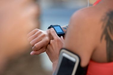 woman using smart watch clipart