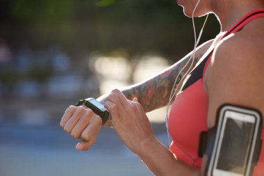 woman using smart watch clipart