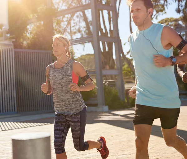 Group of people running in street — Stock Photo, Image