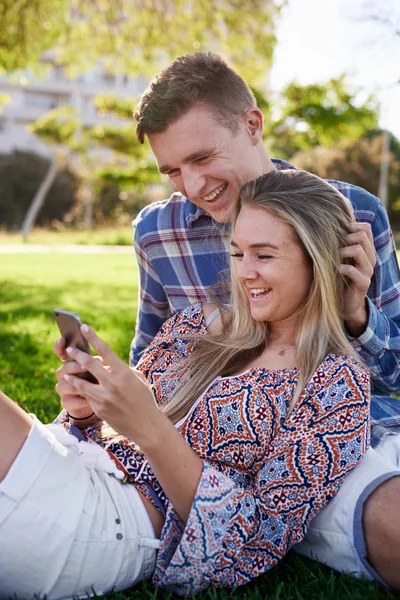Couple browsing mobile phone — Stock Photo, Image
