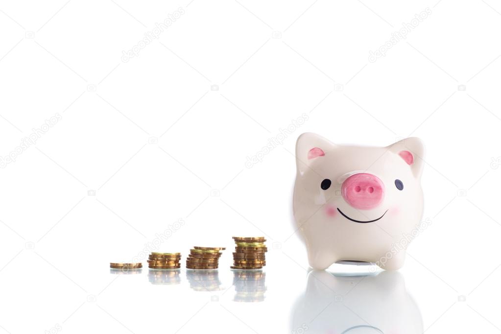 White piggy bank with increasing stack gold coin money
