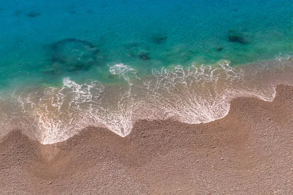 Onda suave de mar na areia — Fotografia de Stock