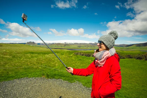 Female tourist making selfie with phone — Stock Photo, Image