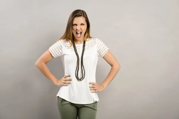 Pretty woman posing in white blouse — Stock Photo, Image