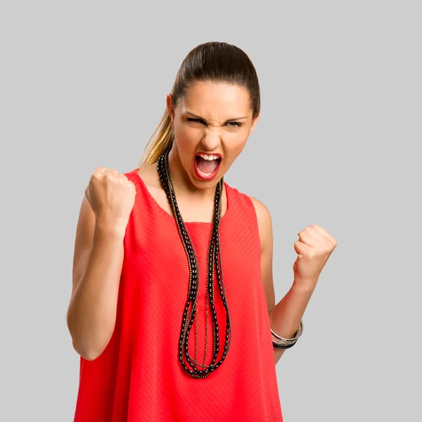 Pretty woman posing in red blouse — Stock Photo, Image