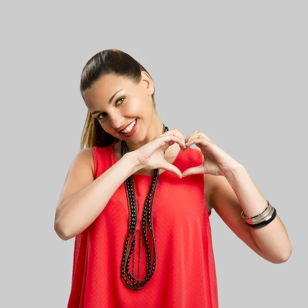 Woman making the heart shape — Stock Photo, Image