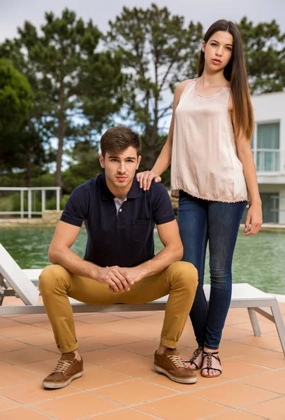 Young couple posing in hotel — Stock Photo, Image