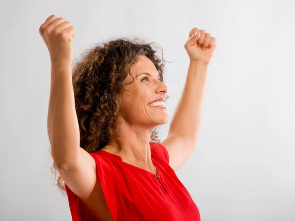 Brunette woman with arms up — Stock Photo, Image