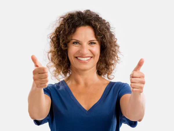 Mujer sonriente con pulgares arriba —  Fotos de Stock