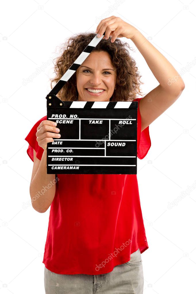 woman holding clapboard 