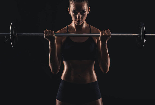 young woman training at the gym