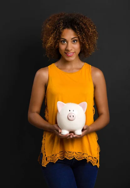 Woman holding Piggybank — Stock Photo, Image
