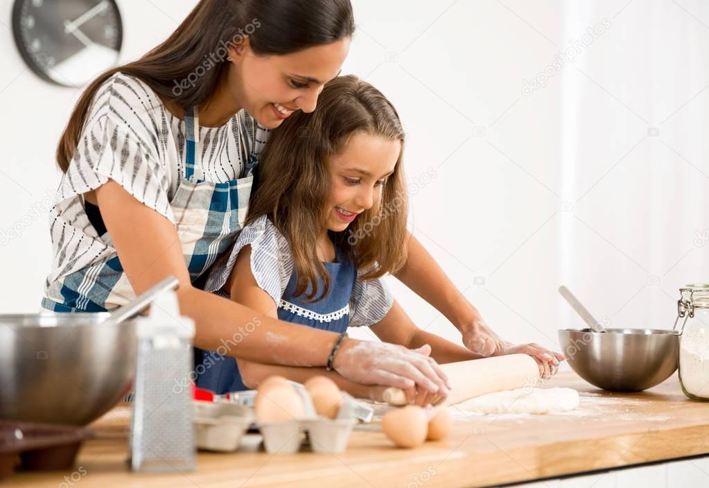 Family having fun in kitchen 