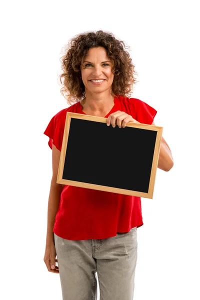 Morena segurando um quadro — Fotografia de Stock