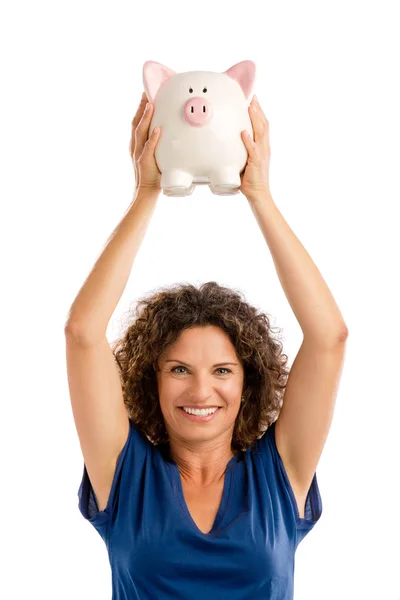 Mujer sosteniendo una hucha — Foto de Stock