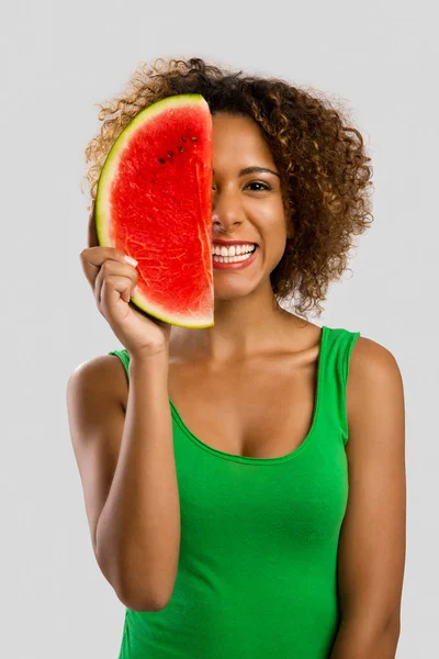 Woman holding watermelon — Stock Photo, Image