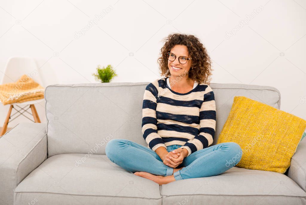  woman  sitting on the sofa