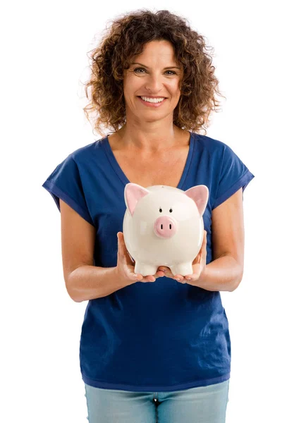 Mujer sosteniendo una hucha — Foto de Stock