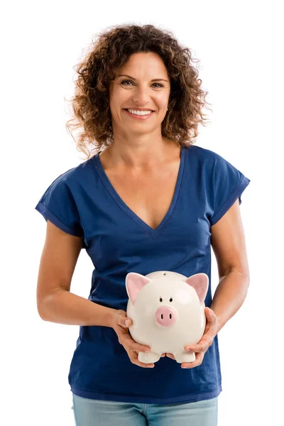 Mujer sosteniendo una hucha — Foto de Stock