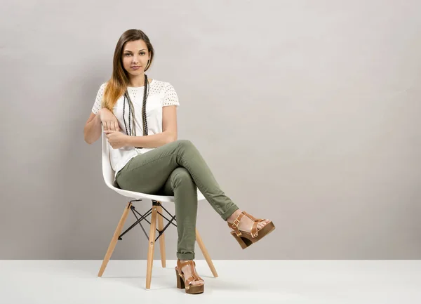 woman sitting on a chair