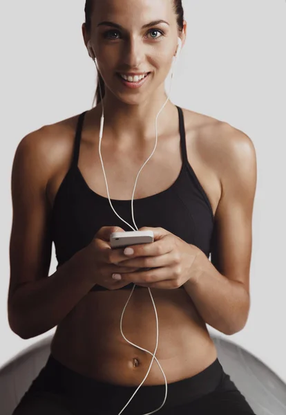 Frau mit Workout-Playlist — Stockfoto