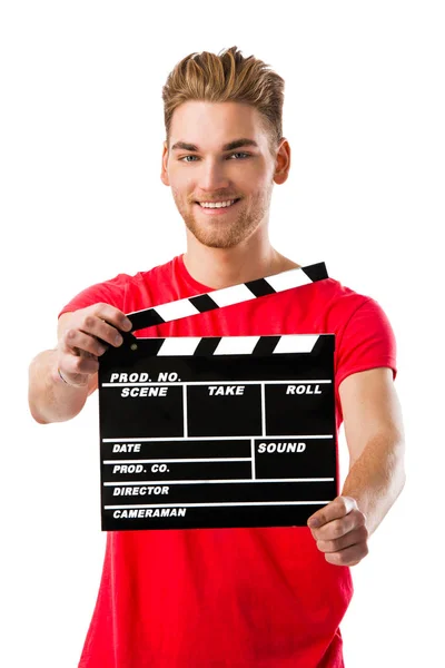 Young man holding a clapboard — Stock Photo, Image