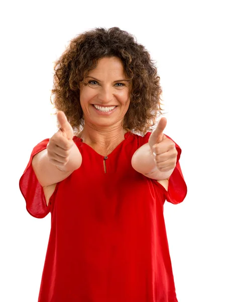 Middle aged brunette with thumbs up — Stock Photo, Image