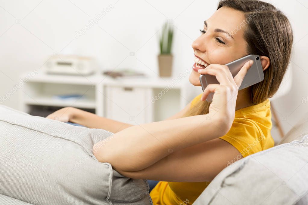 Young woman talking on phone