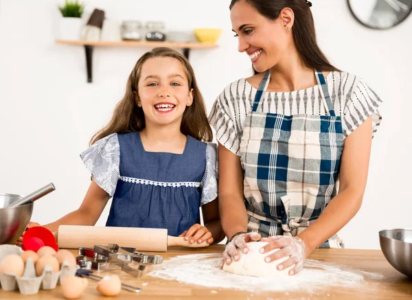 mother and daughter in the kitchen