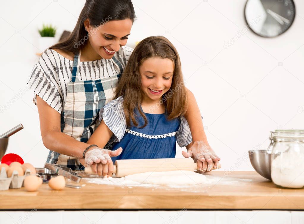  mother and daughter in the kitchen 