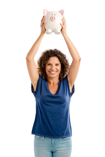 Middle aged woman holding  piggybank — Stock Photo, Image