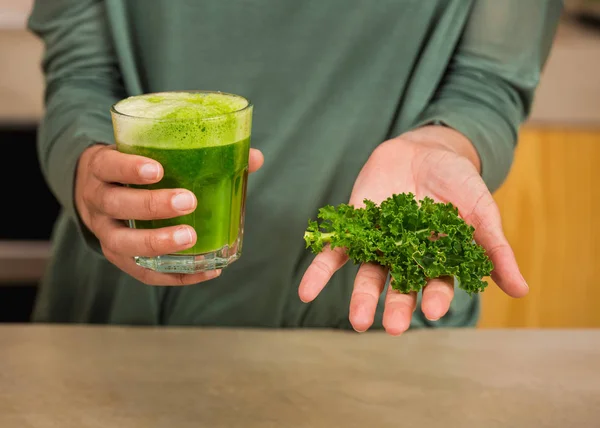 Woman holding glass of detox juice — Stock Photo, Image