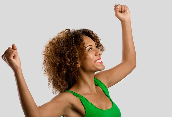 Woman with arms raised — Stock Photo, Image