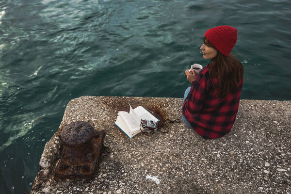 Beautiful woman with mug of coffee