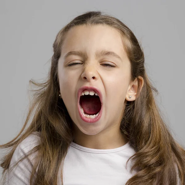 Niña con la boca abierta — Foto de Stock