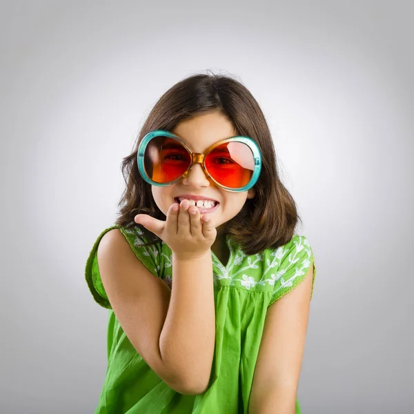 Girl wearing funny sunglasses — Stock Photo, Image