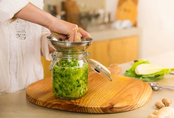 Woman preparing fermented preserved vegetables — Stock Photo, Image